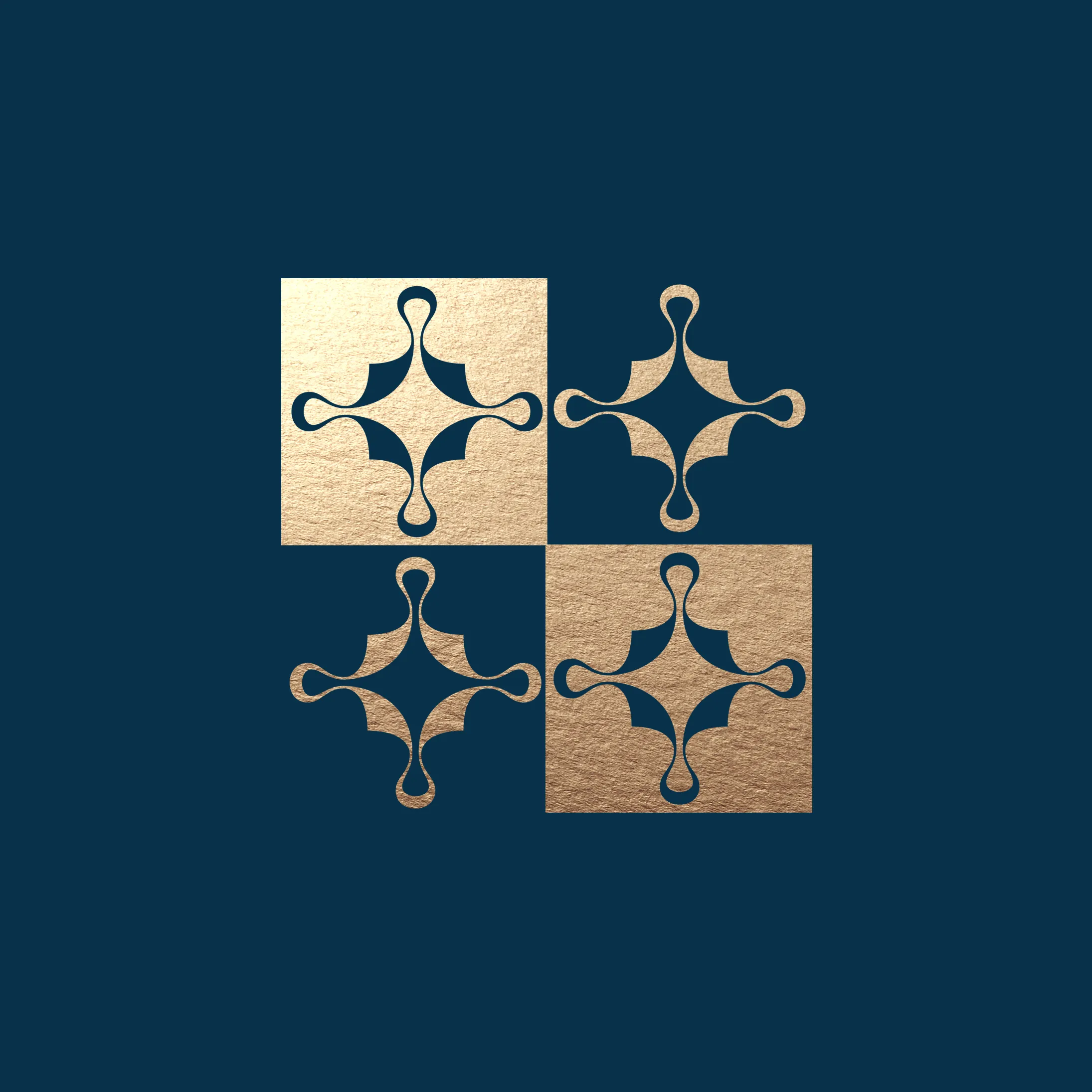 Kella's restaurant decorative brand pattern featuring four gold geometric star and diamond motifs arranged in a square grid on a dark teal background, rendered in a metallic embossed style.